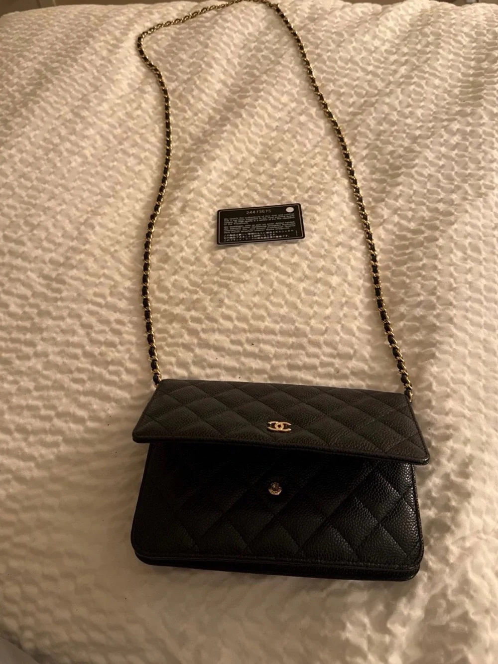CHANEL Black Quilted Caviar Leather Wallet on Chain with Gold CC